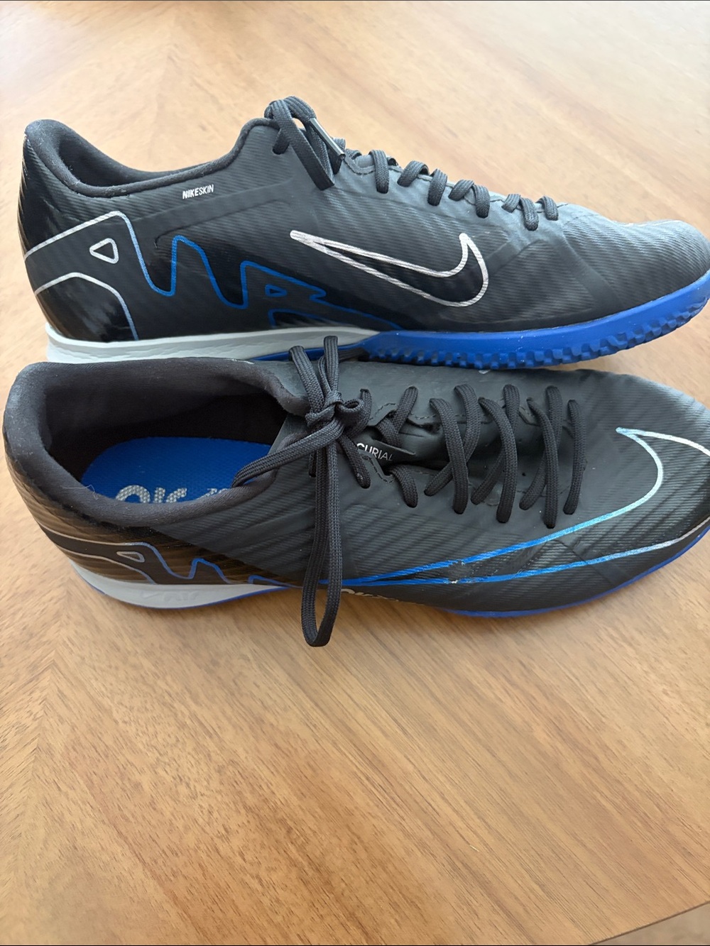 Nike Black Athletic Indoor Soccer Shoes with Blue Accents